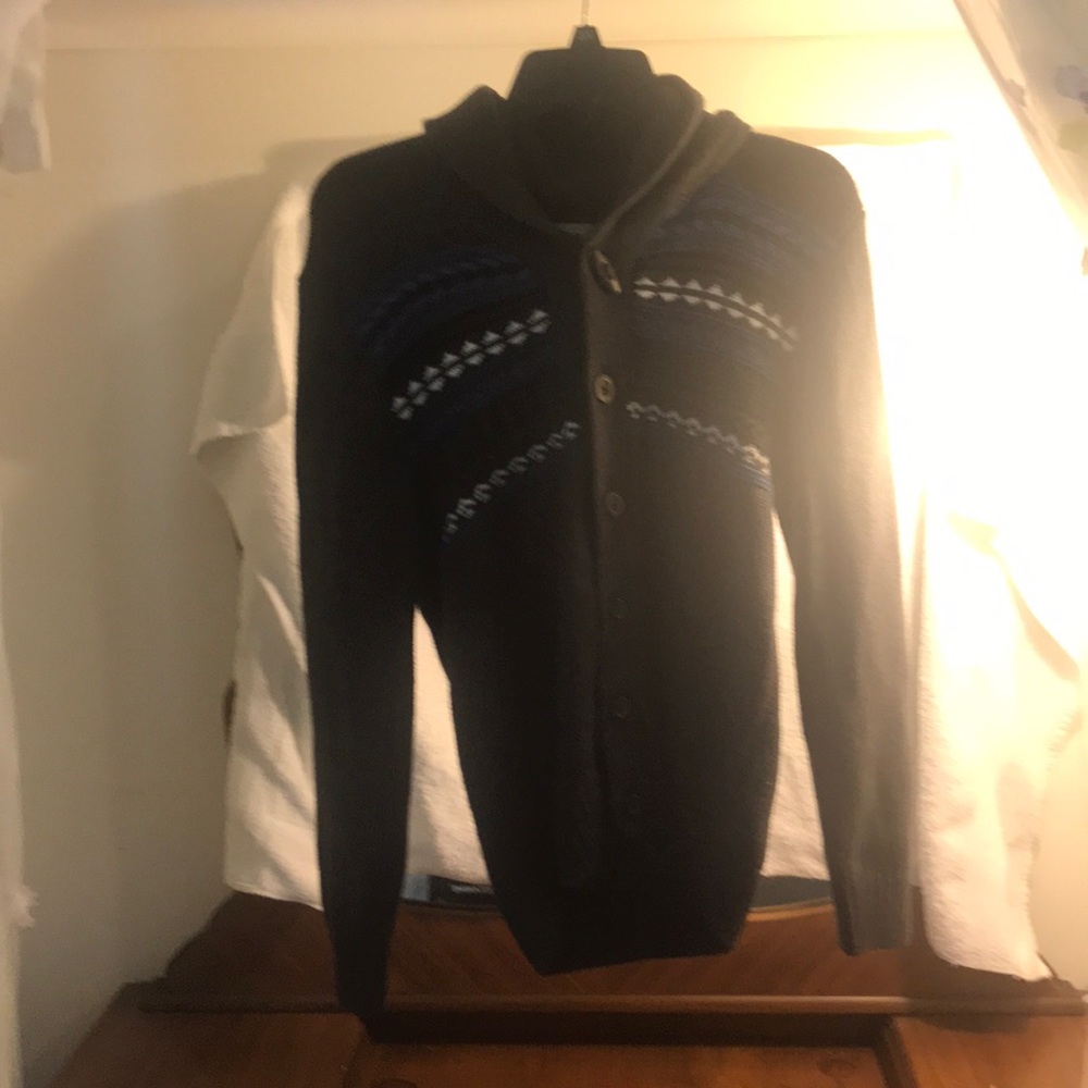 A grey, blue, and whit sweater Cardigan